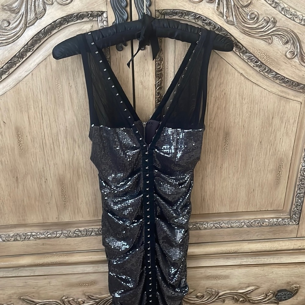 Nicole killer black corset type fitted sparkly dress.